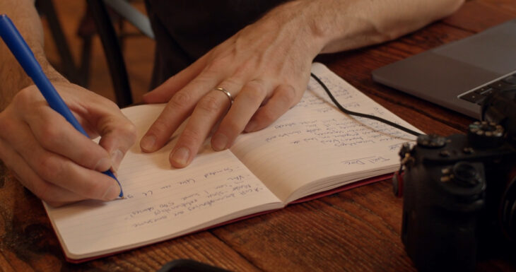 A woman writing in a journal