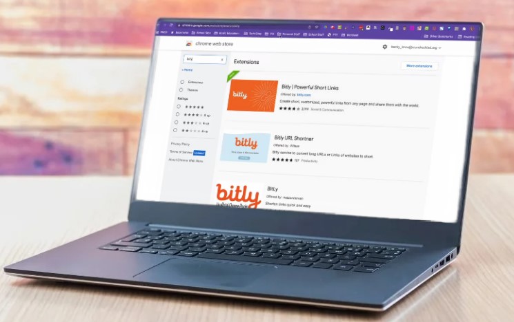 Laptop with a Bitly chrome extension on it