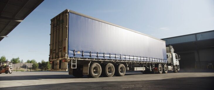 Full truckload vehicle at a distribution center, common in Amazon FBA shipping and third-party logistics