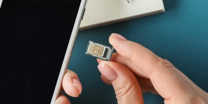 Inserting a SIM card into a phone to activate service