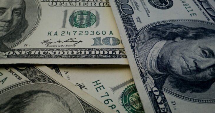 Stack of U.S. hundred-dollar bills representing financial reserves and monetary value