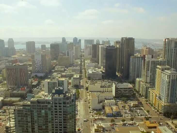 Aerial view of downtown San Diego showing modern high-rises and coastal layout