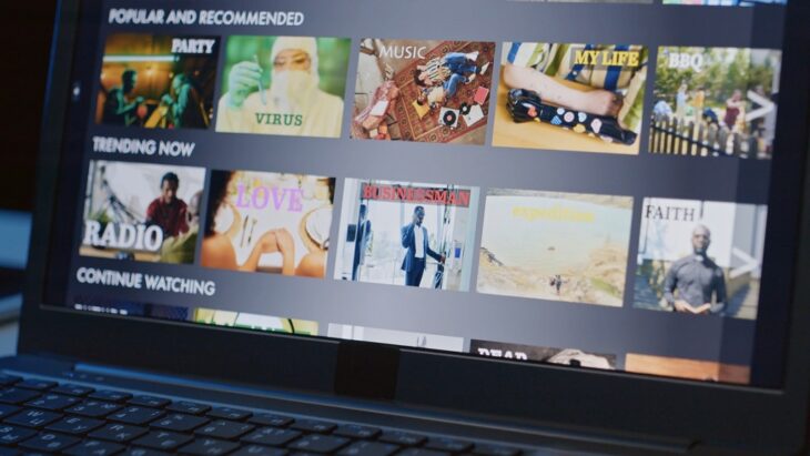 Laptop screen showing personalized content suggestions on a streaming platform