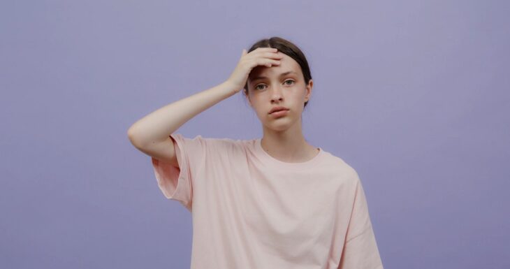 Young woman confused by complicated loyalty program terms