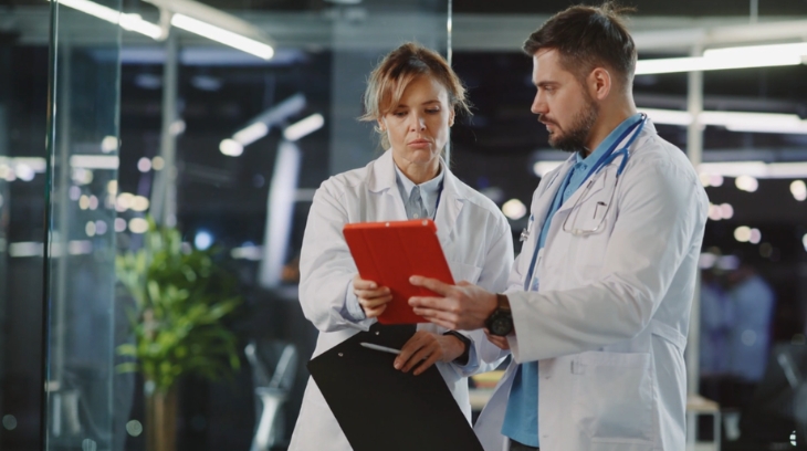 Healthcare leaders reviewing strategic priorities together during a planning discussion