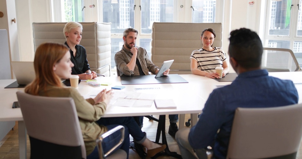 Colleagues planning strategy to prepare for business meeting