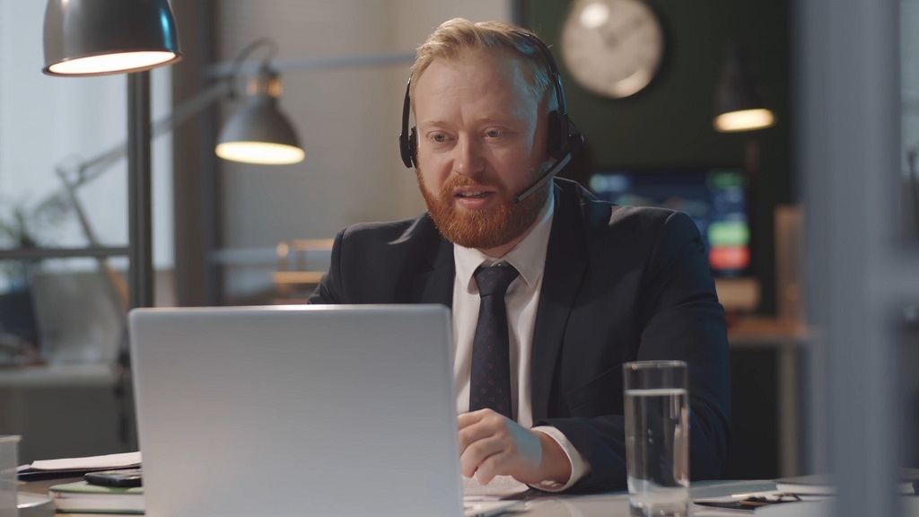 Business professional testing technology before an online meeting